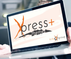 Xcite Xpress Themes shown on laptop computer